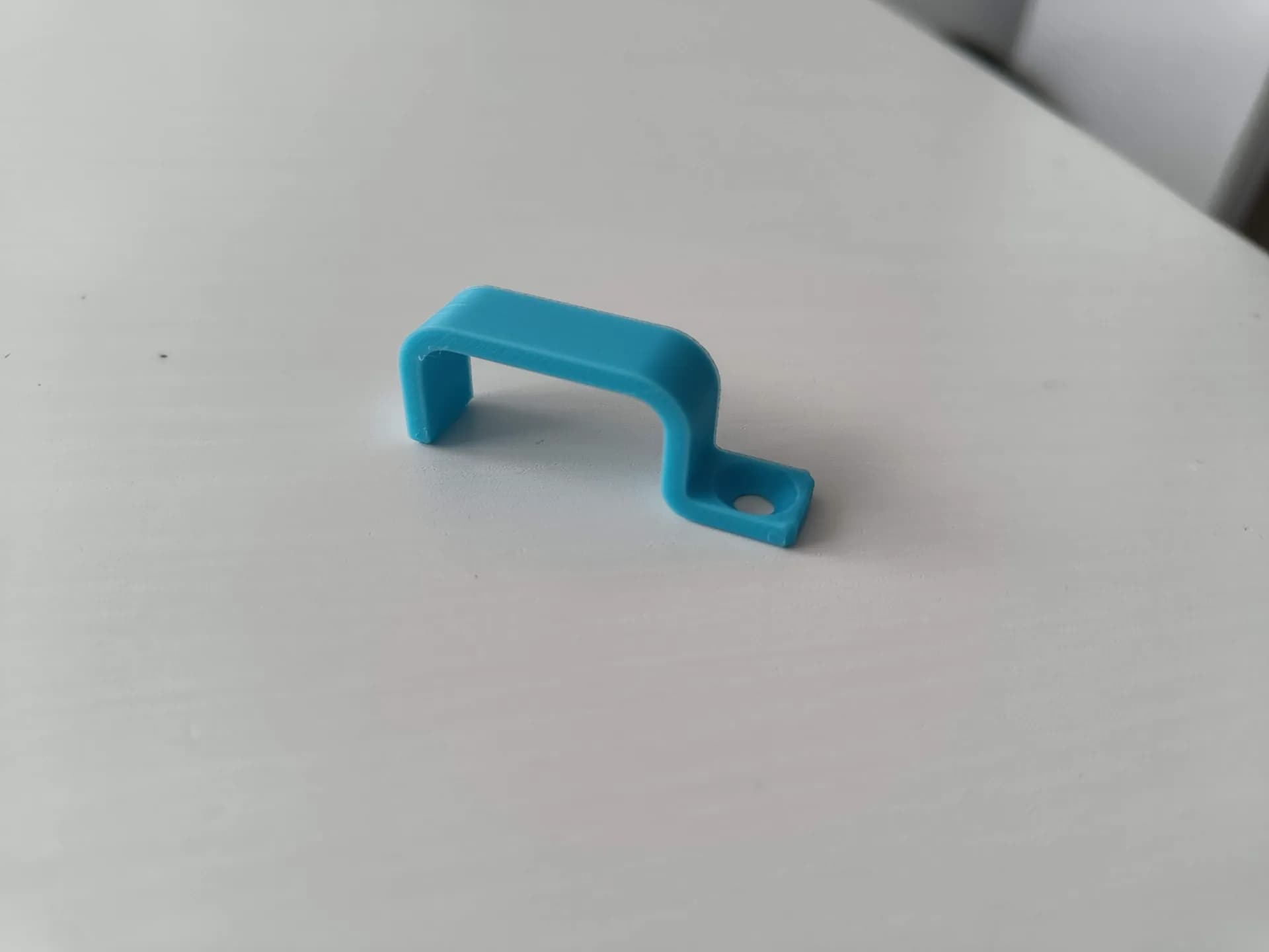 Cable management under desk bracket